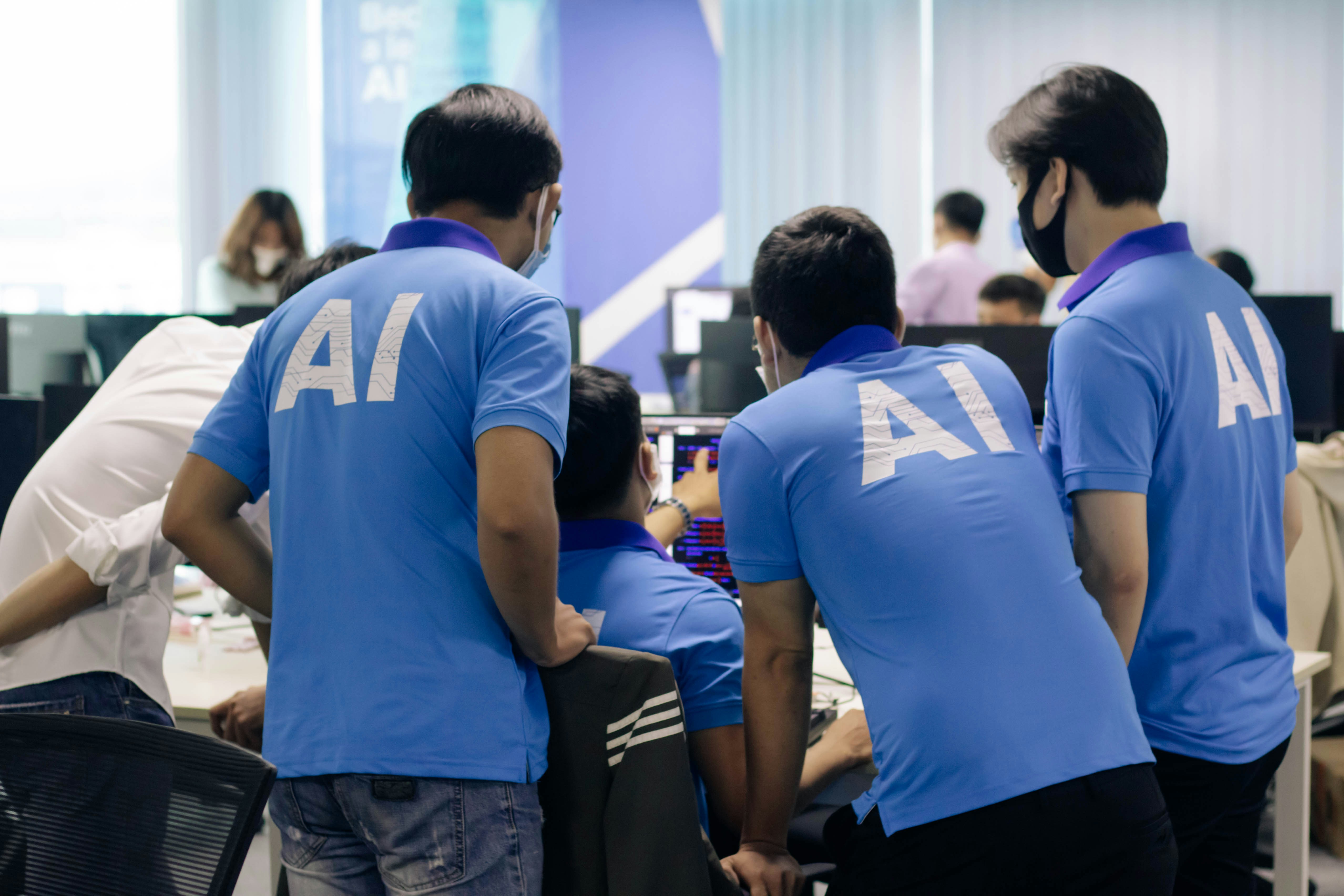AI team collaboration in modern office environment